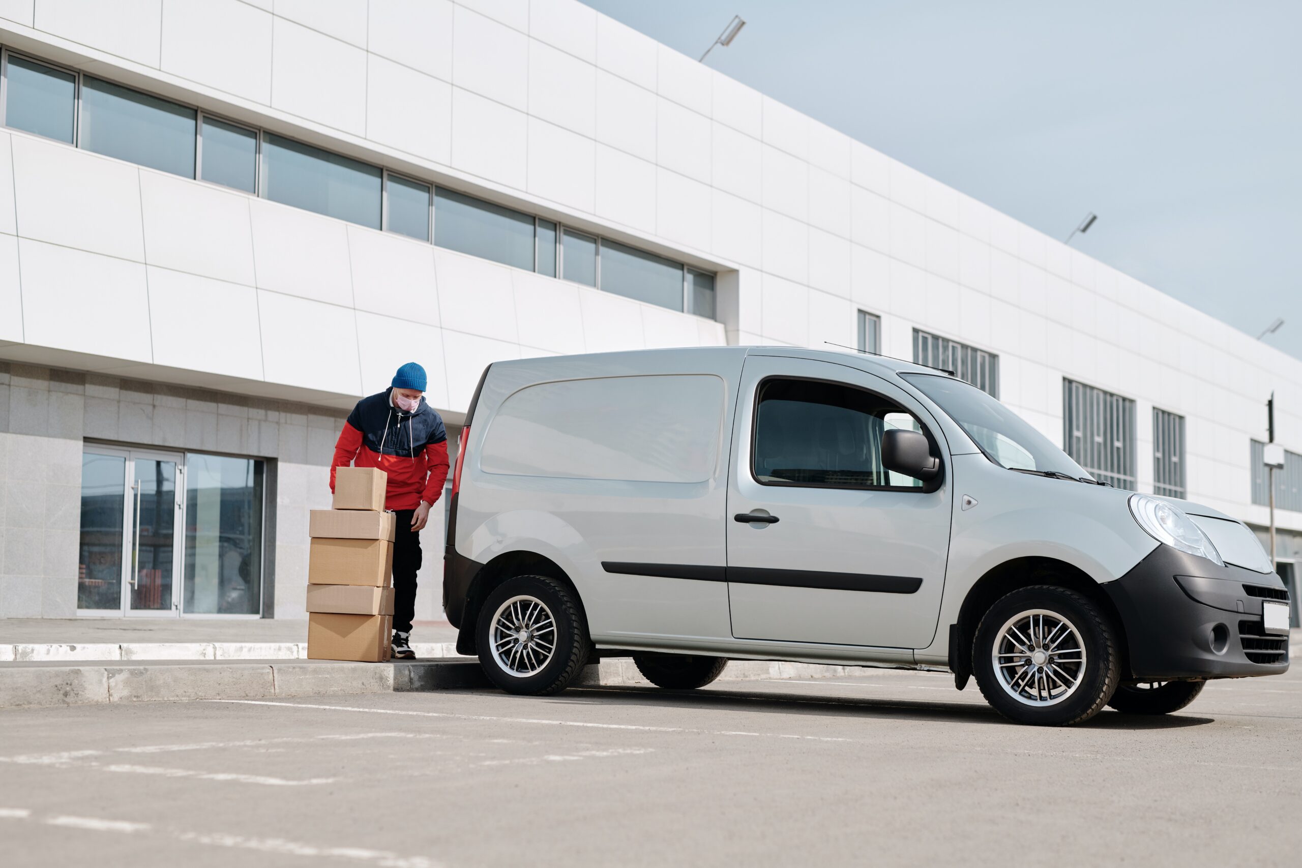 Man loading van with boxes